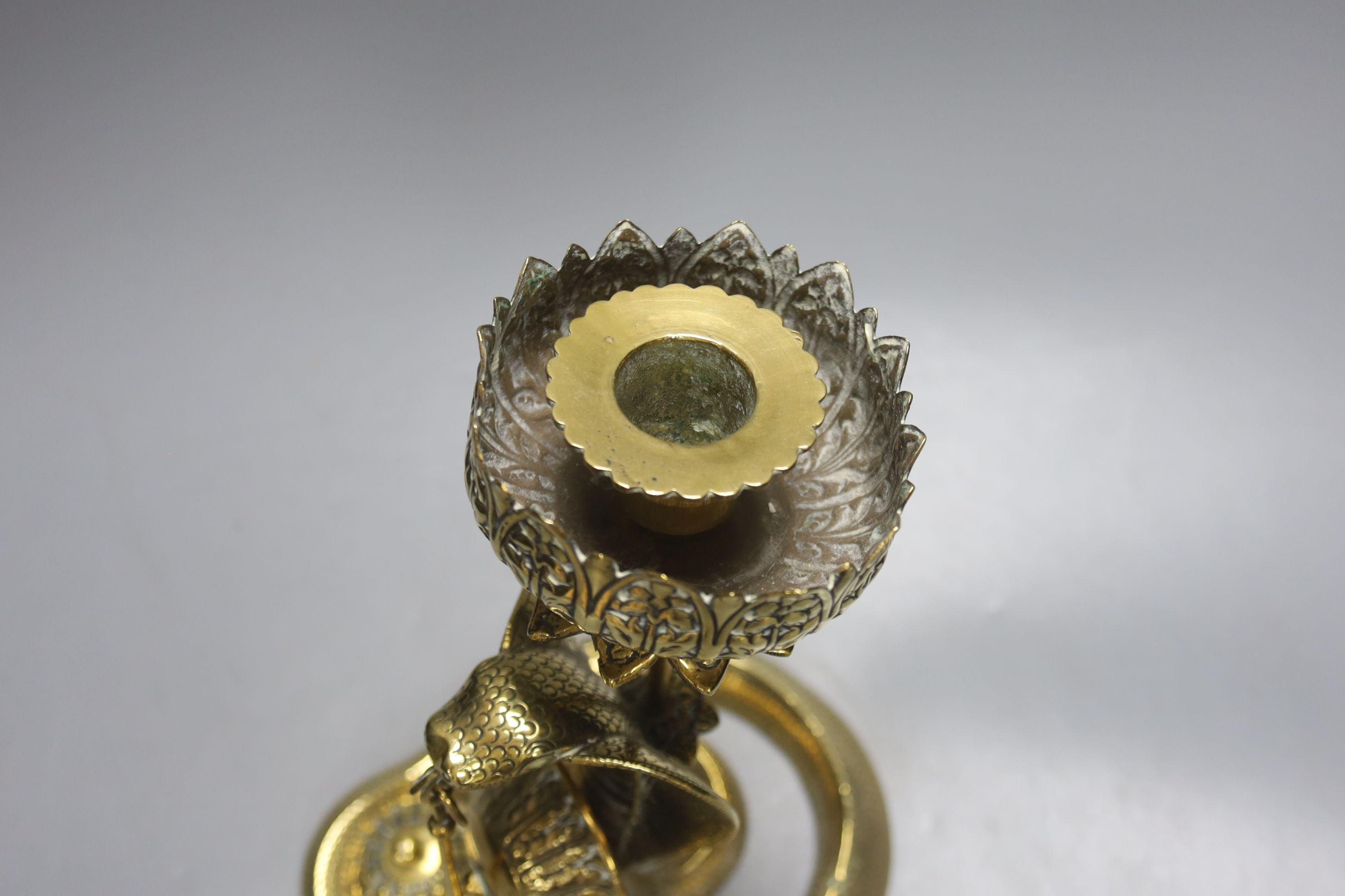 An Indian brass ‘cobra’ desk stand, 26 cms high.
